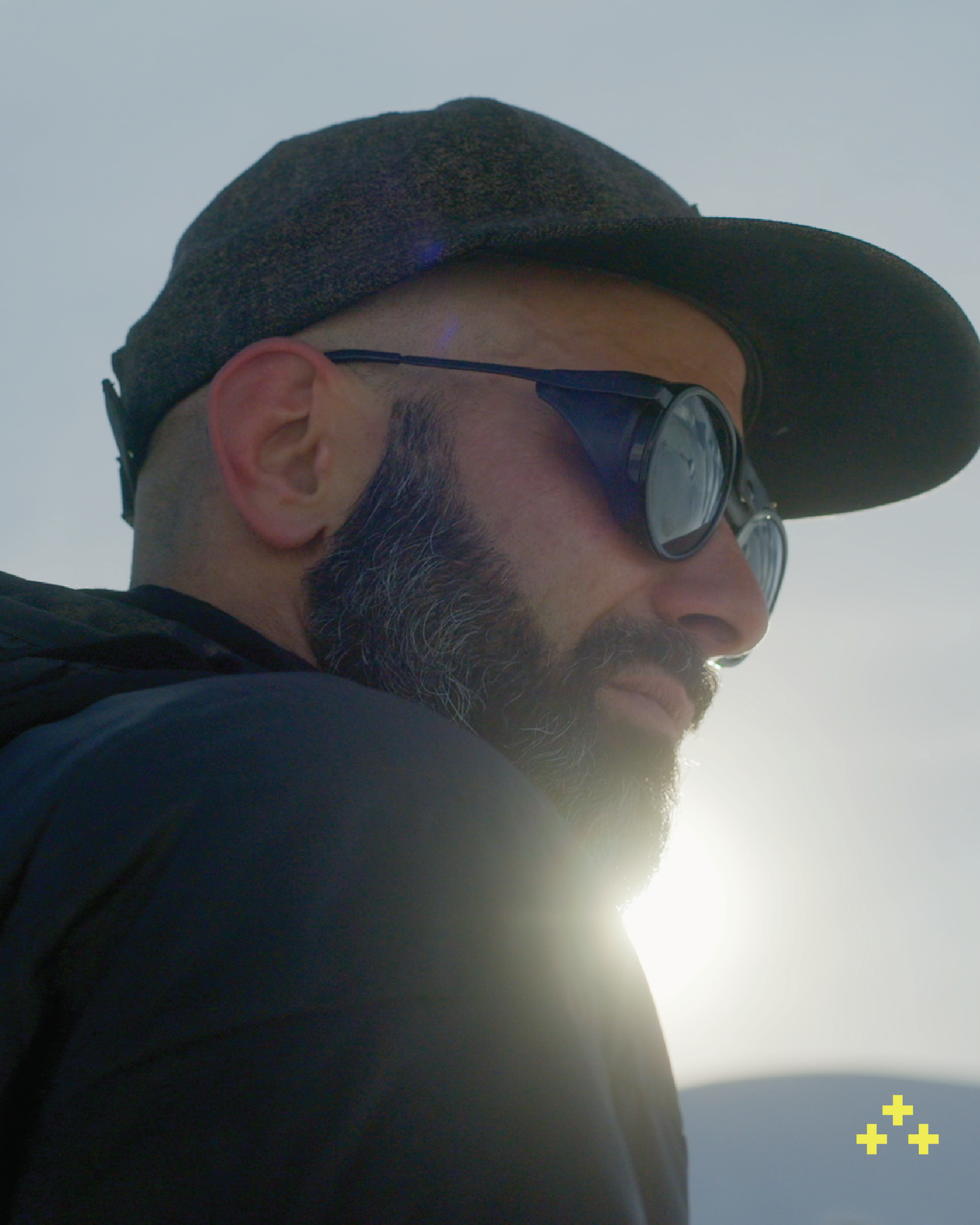 Close-up portrait of Greg Tuscher wearing Moiry sunglasses with Zeiss Vision Category 4 lenses
