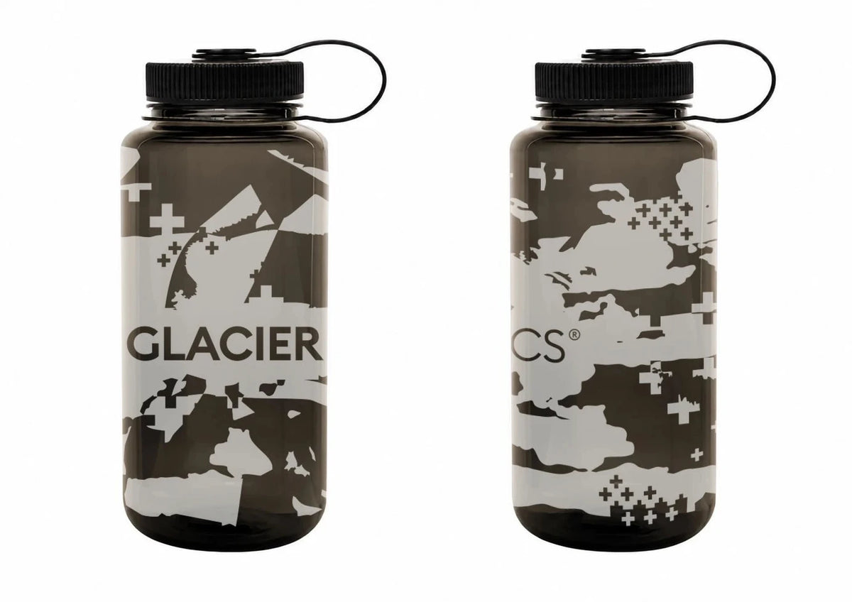 Two dark gray Nectar water bottles with black caps and carrying loops, featuring a white and gray abstract camouflage pattern with the word 'GLACIER' on the left bottle, shown on a plain white background.